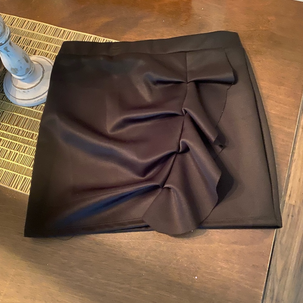 Juniors black ruffle mini skirt